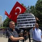 Turkish civil servants stage a protest outside Foreign Ministry, demanding the release of 49 Turkish officials seized in the Turkish consulate in Mosul, northern Iraq in June by Islamic militants, in Ankara, Turkey, Thursday, July 17, 2014.