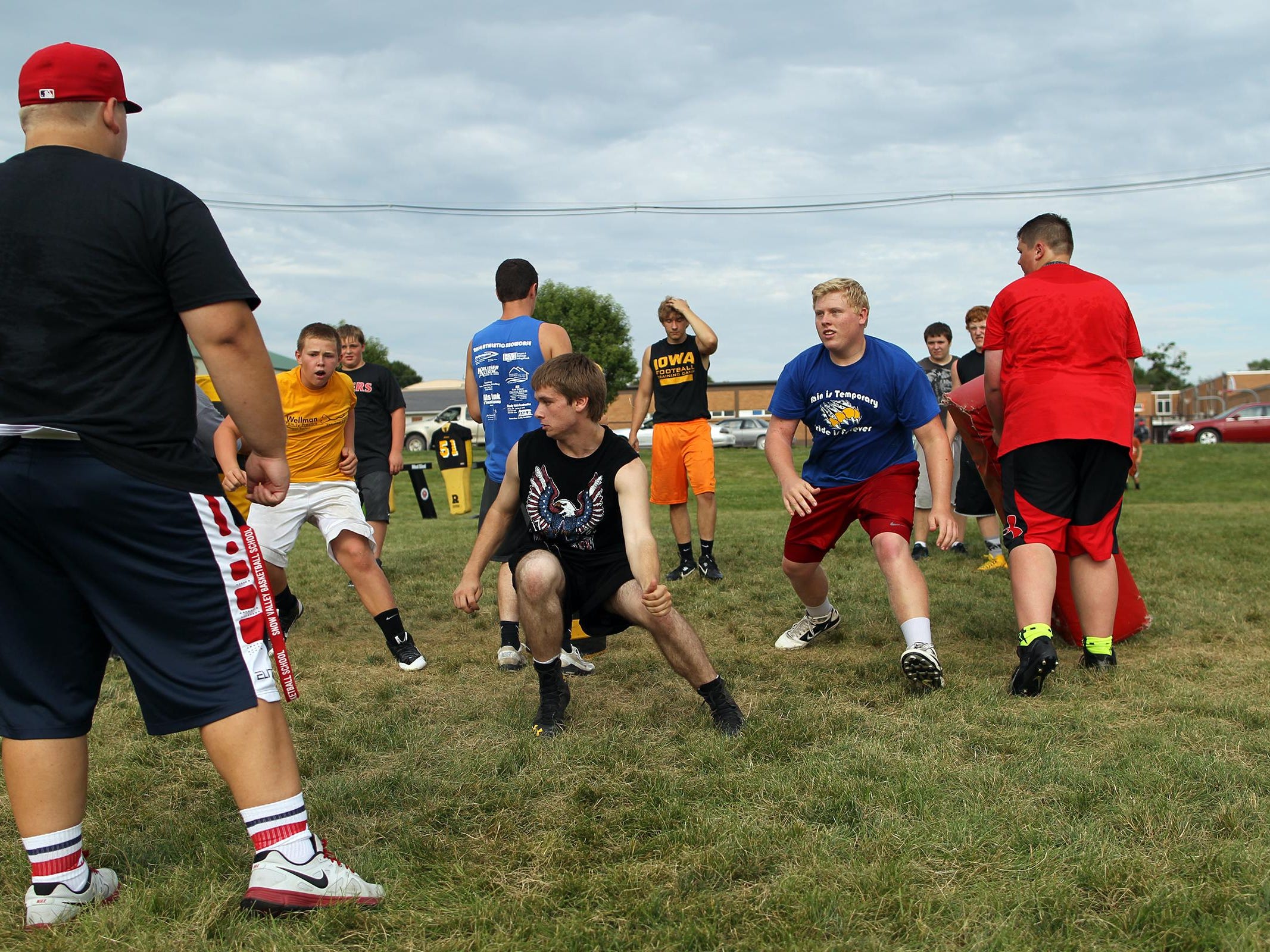 Lone Tree defenders run drills on Aug. 6. Senior Greg Feldman, an all-district linebacker, leads the defense after finishing third on the team with 48 tackles in 2014.