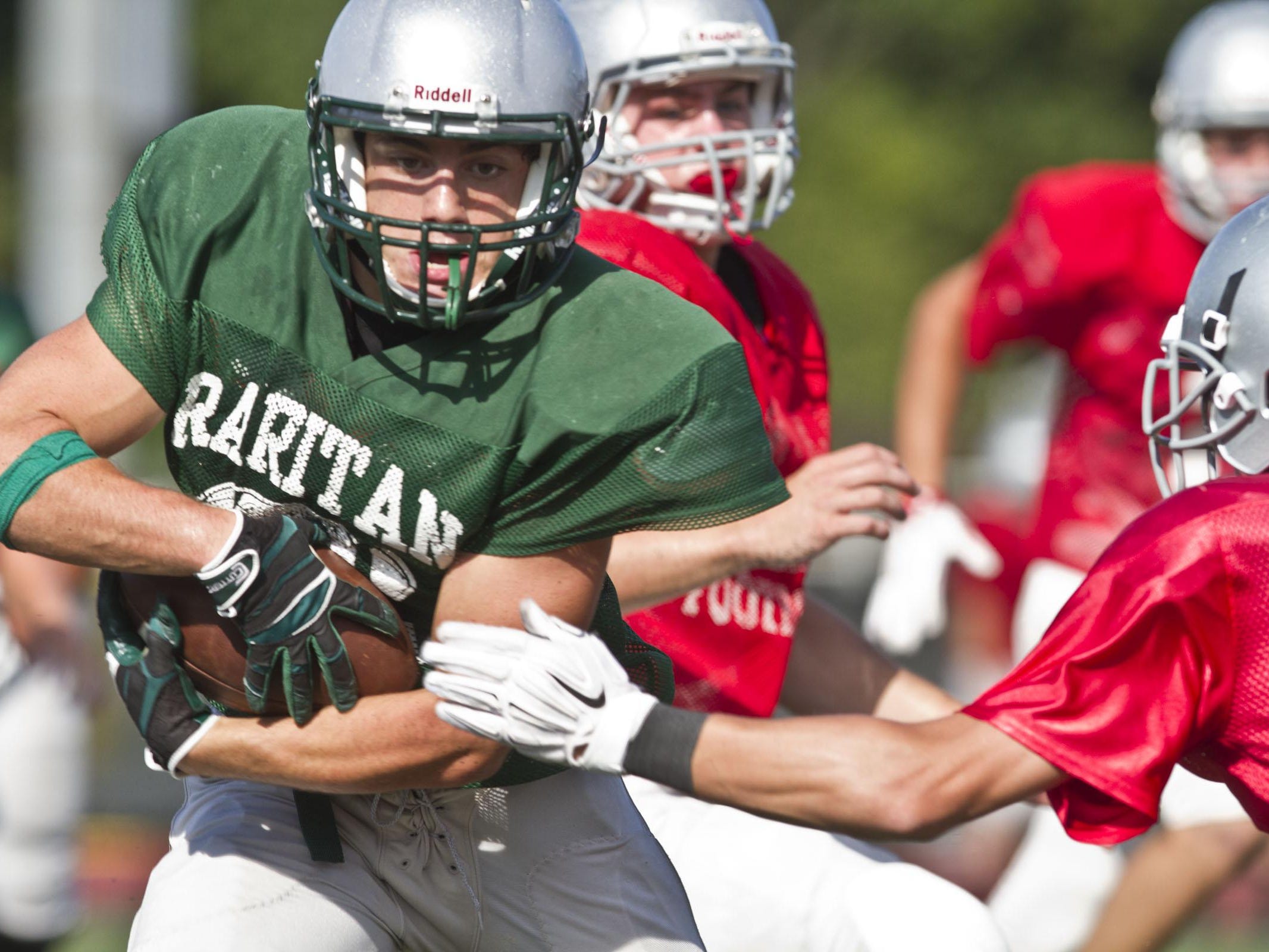 Raritan’s Derek Ernst runs with the ball during a scrimmage against Wall on Aug. 27.