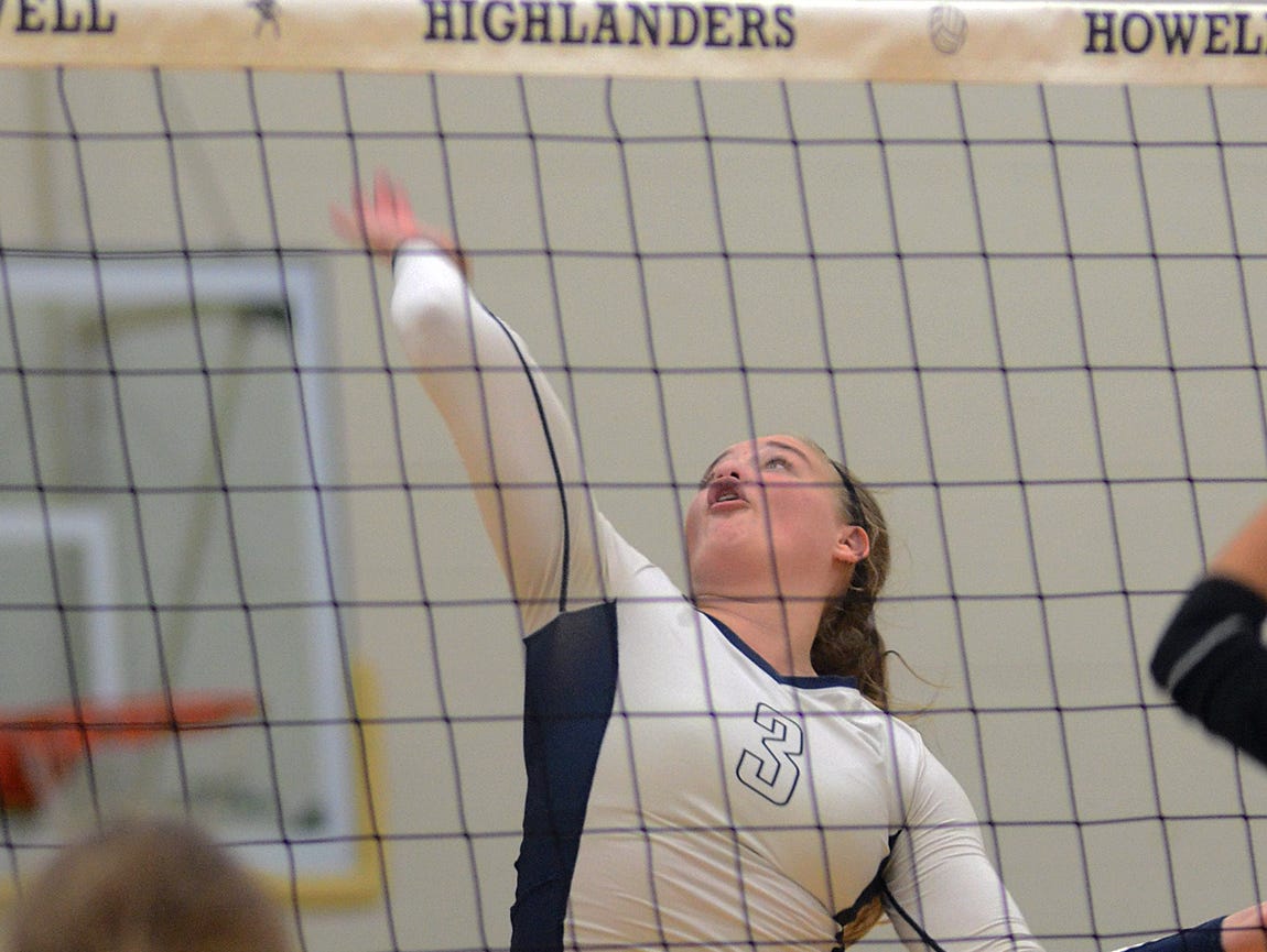 Hartland's Megan Acs was said by her coach to be the Player to Watch in the Class A District at Howell, and she was Wednesday night, coming up big down the stretch as Hartland beat Brighton, 3-2.