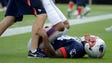 New England Patriots cornerback Cyrus Jones is assisted