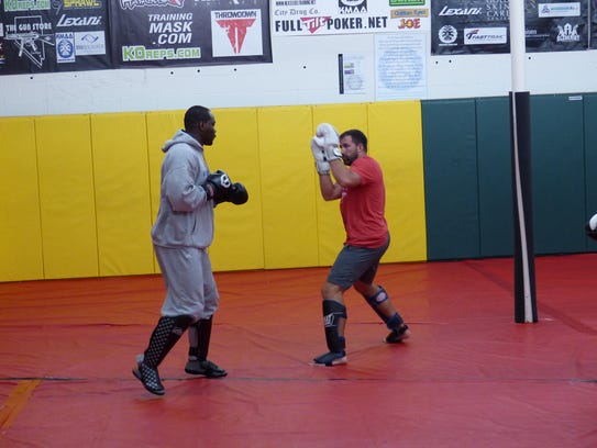 Ovince St. Preux spars with Terry Bullman, a retired