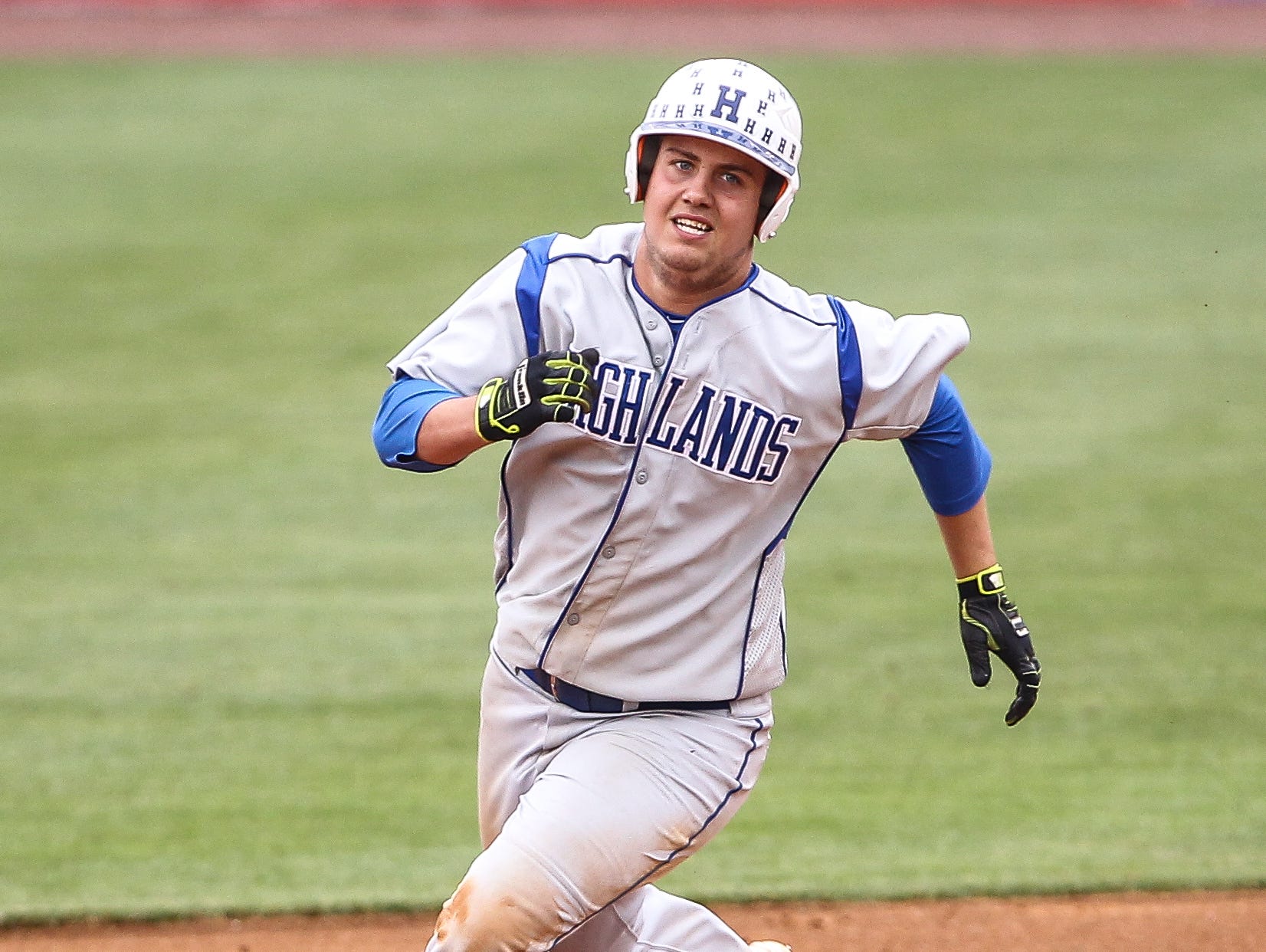 Highlands' Todd Ramey rounds second base during the Bluebirds' game against McCracken County at the state tournament.