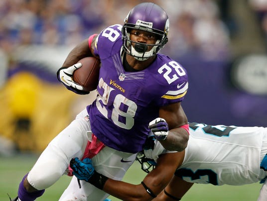 1381694894000--1a-action-adrian-peterson