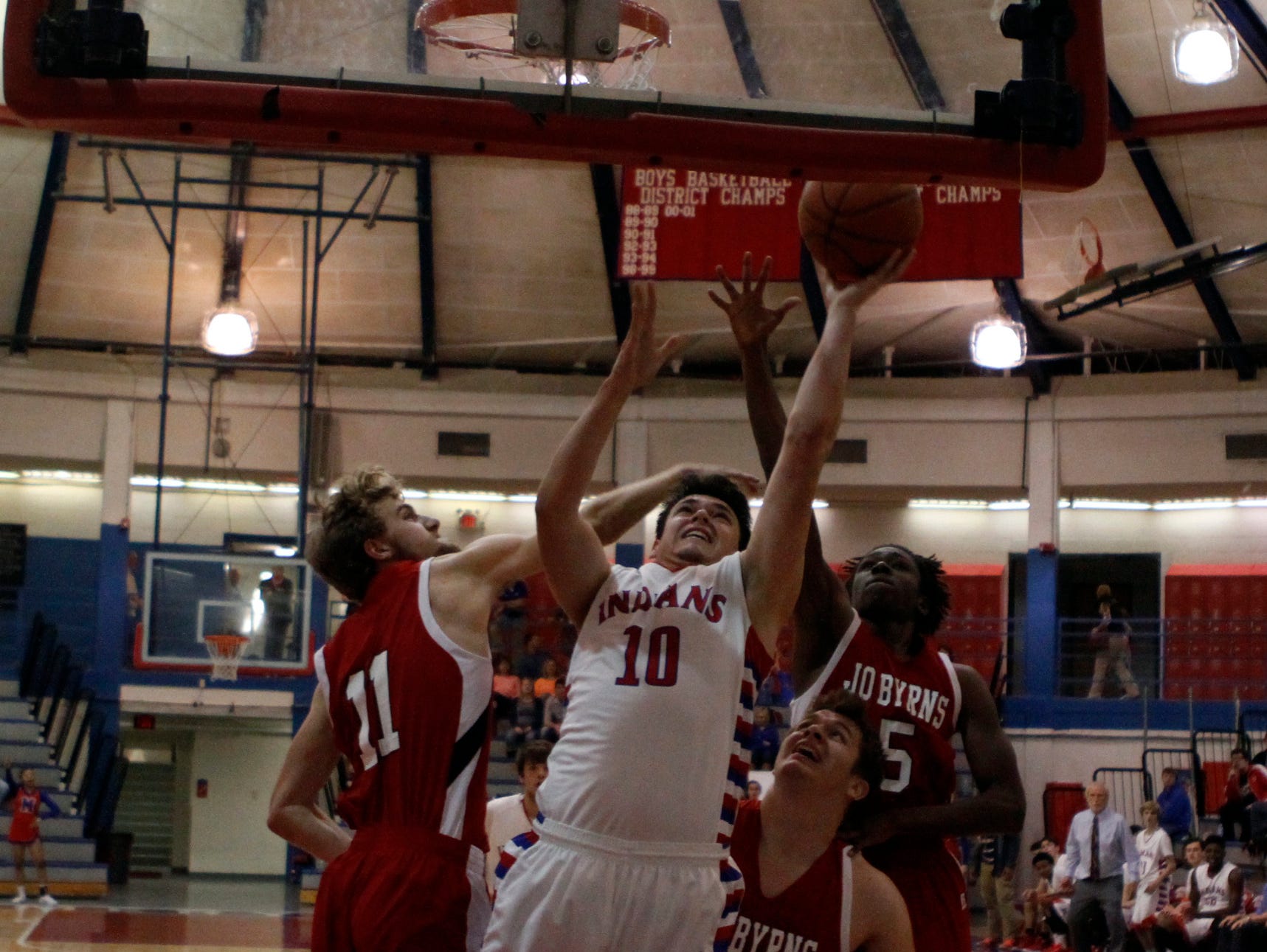 Montgomery Central's Jordan Nelson (10) scored 10 points in Montgomery Central's 55-20 victory over Jo Byrns Friday night.
