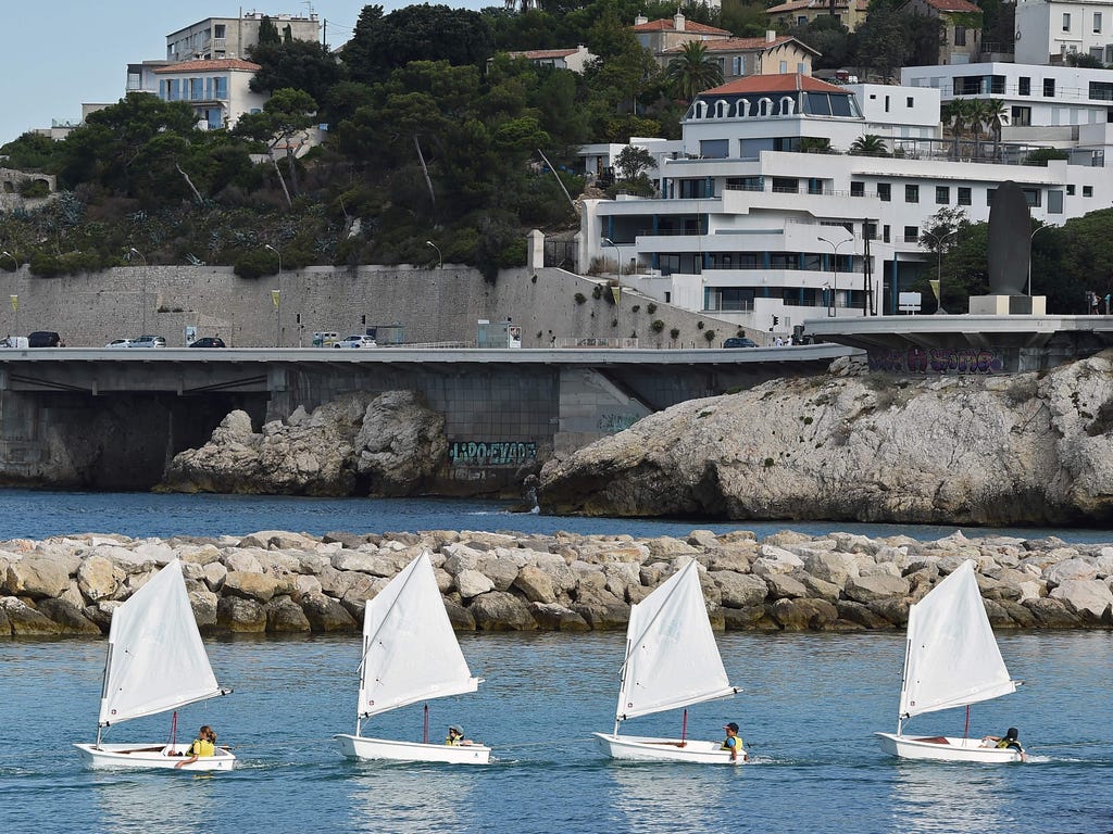 Sailors leave the Roucas-Blanc nautical base in southern Mediterranean city of Marseille, the 2017 European Capital of Sport, on August 7, 2017. Paris' success in its bid to host the 2024 Olympic Games means that Marseille has been chosen to host par
