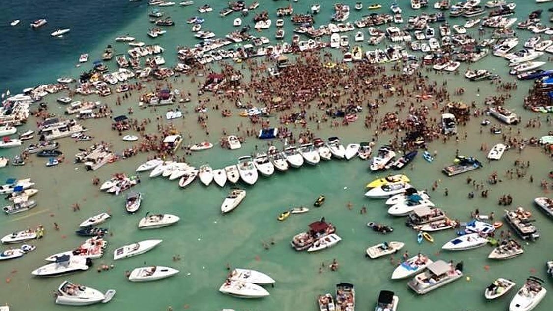 Torch Lake revelers wearing out