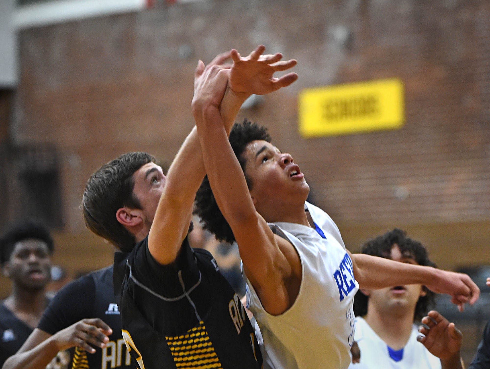 Antioch's Tyler Krieg attempts to block a shot by Reed's Matthew Williams during the Rail City Classic Basketball Tournament at Sparks High School on Tuesday.