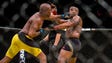 Anderson Silva punches Daniel Cormier during their