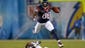 Houston Texans receiver Andre Johnson (80) leaps over San Diego Chargers cornerback Richard Marshall (31) on a 27-yard reception in the second quarter at Qualcomm Stadium.
