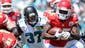 Kansas City Chiefs running back Jamaal Charles (25) runs the ball past Jacksonville Jaguars safety Johnathan Cyprien (37) during the game at EverBank Field.