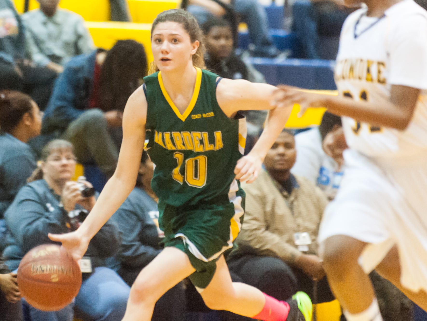 Mardela's Taylor Ross (10) works down court against Pocomoke at Pocomoke High on Thursday afternoon.
