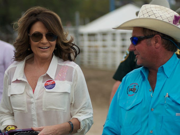 Sarah Palin speaks with Jimmy Fussdell, rodeo organizer