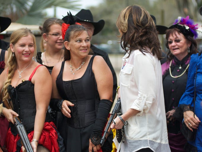 Sarah Palin talks with members of the Arcadia Rodeo