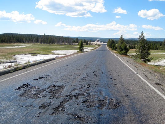 [Image: 1405024240000-AP-Yellowstone-Hot-Road.jpg]