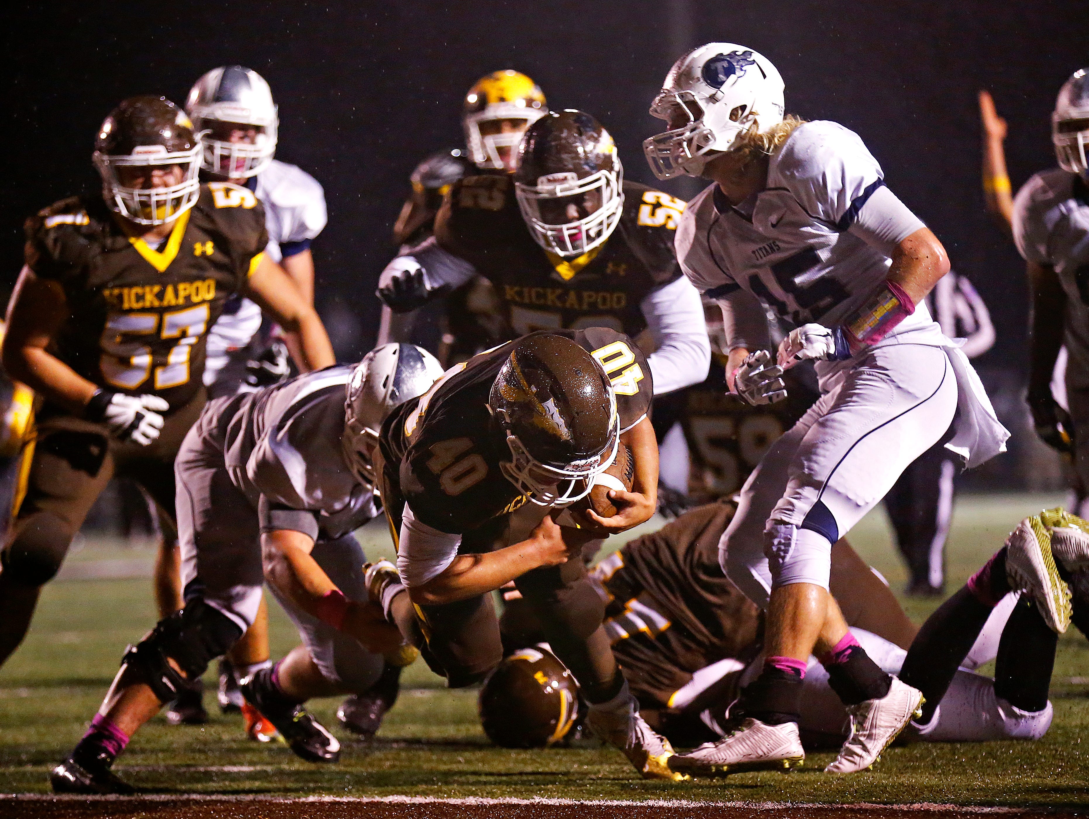 Kickapoo High School running back Malachi Stout (40) makes his way to the end zone for a touchdown during third quarter action of the Chiefs' game against Lee's Summit West High School at Pottenger Stadium in Springfield, Mo. on Oct. 30, 2015. Kickapoo won the game 26-7.