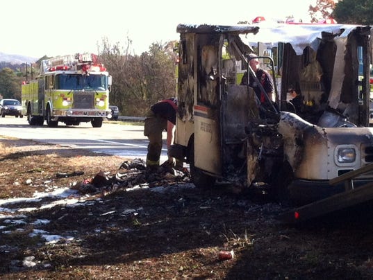U.S. Post Office vehicle destroyed by fire(Photo: Brian Holt, WBIR)