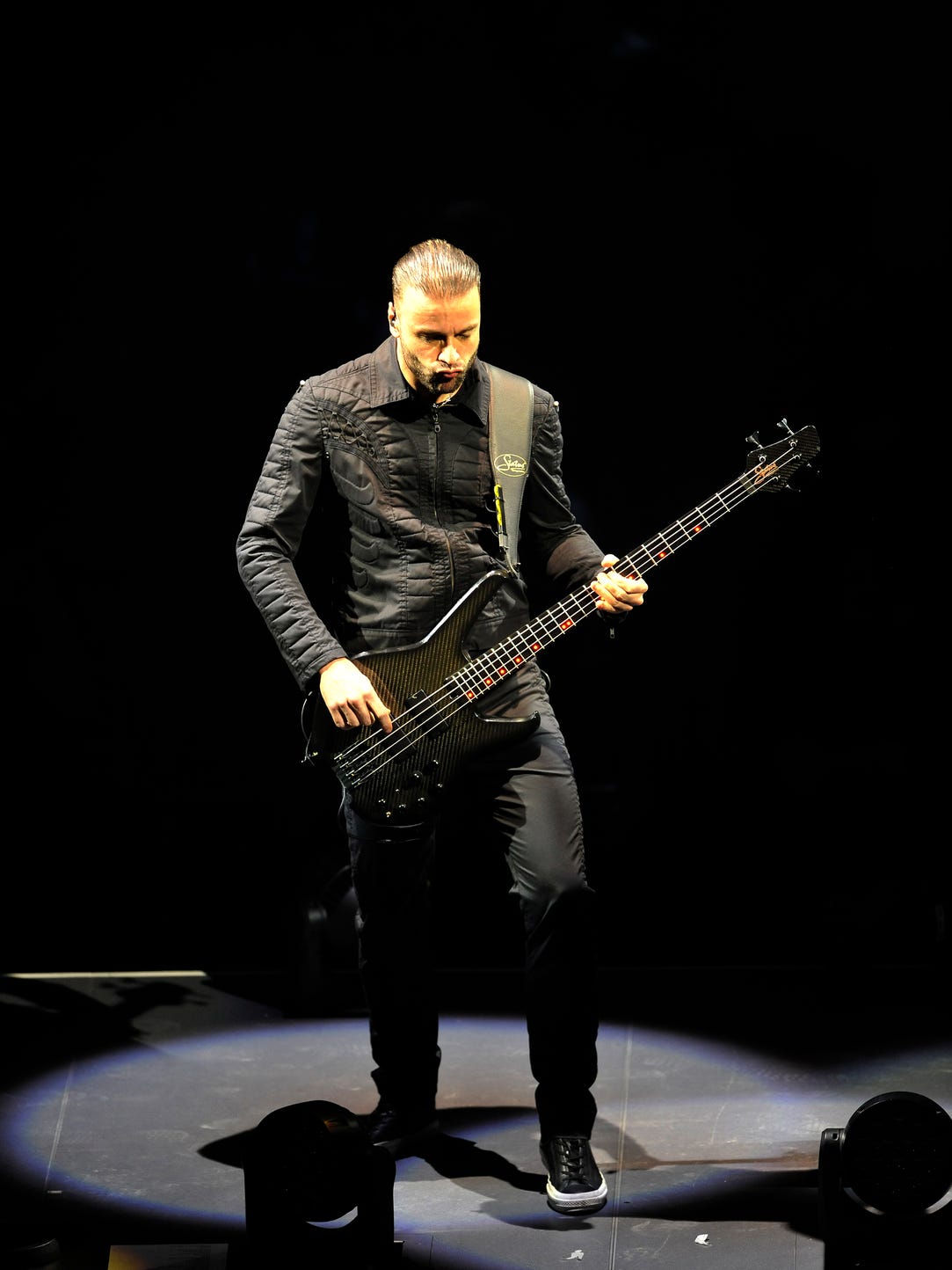 Bassist Christopher Wolstenholme of Muse performs at