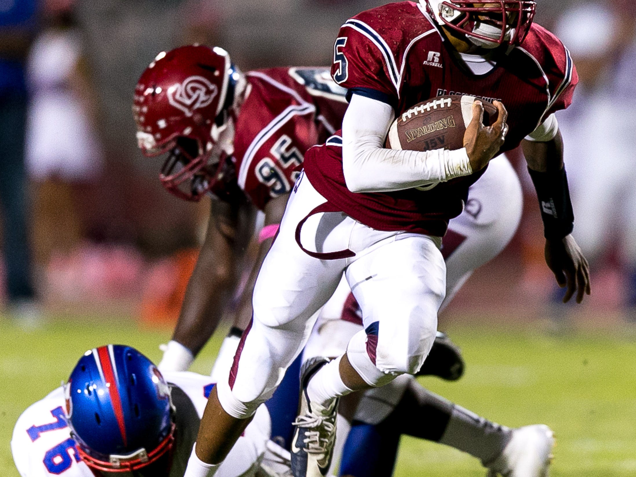 La Quinta's Eric Pascascio (No. 5) runs for a touchdown in the first half against Indio during a DVL football game held at La Quinta High School, Friday evening, October 3, 2014. Photo by Gerry Maceda, Special to The Desert Sun