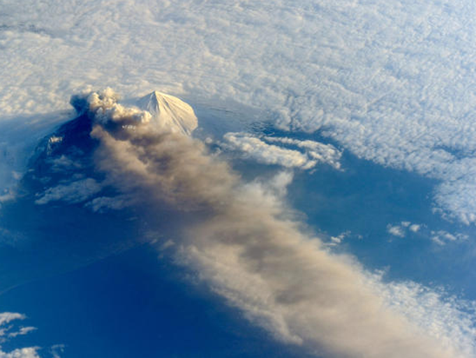 Astronauts aboard the International Space Station photographed these striking views of Pavlof Volcano on May 18, 2013.
Situated in the Aleutian Arc about 625 miles southwest of Anchorage, Pavlof began erupting on May 13, 2013. The volcano jetted lava into the air and spewed an ash cloud 20,000 feet high.