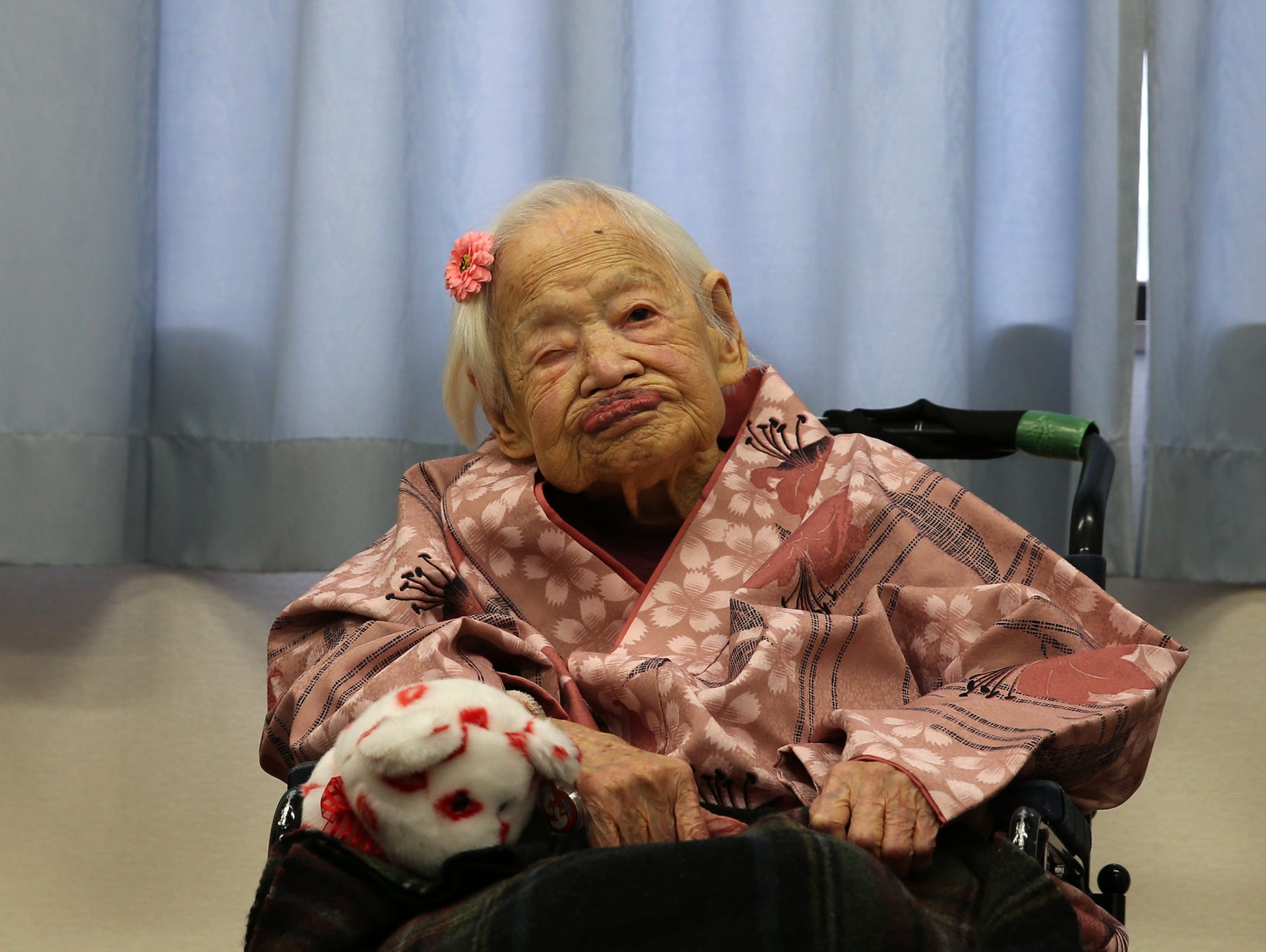 Misao Okawa, the world's oldest Japanese woman, poses
