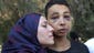 Tariq Abu Khder, a teenager who was allegedly beaten while in police custody, is hugged by his mother following a hearing at Jerusalem Magistrates Court on July 6. He was arrested in Shuafat during violent clashes with Israeli riot police and was given nine days house arrest while authorities continue to look into the matter.