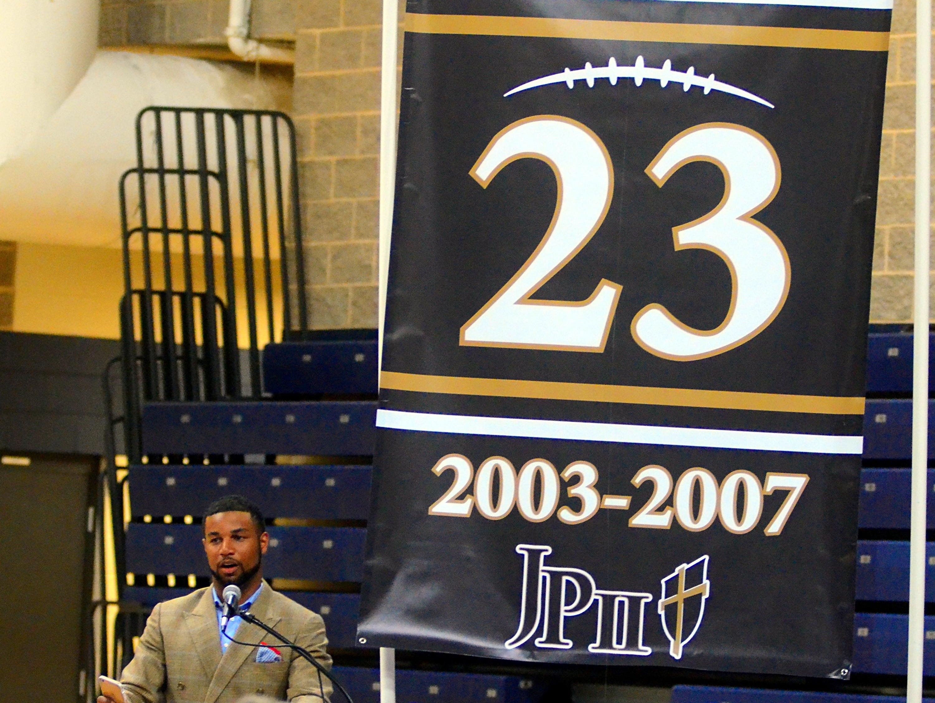 Detroit Lions wide receiver Golden Tate speaks during his jersey-retirement ceremony on Thursday evening at Pope John Paul II High.