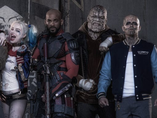 Margot Robbie, left, Will Smith, Adewale Akinnuoye-Agbaje