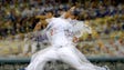 May 12: In a multiple exposure image, Dodgers ace Clayton