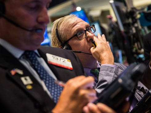 Traders work on the floor of the New York Stock Exchange on Sept. 2, 2015.  (Photo by Andrew Burton/Getty Images)