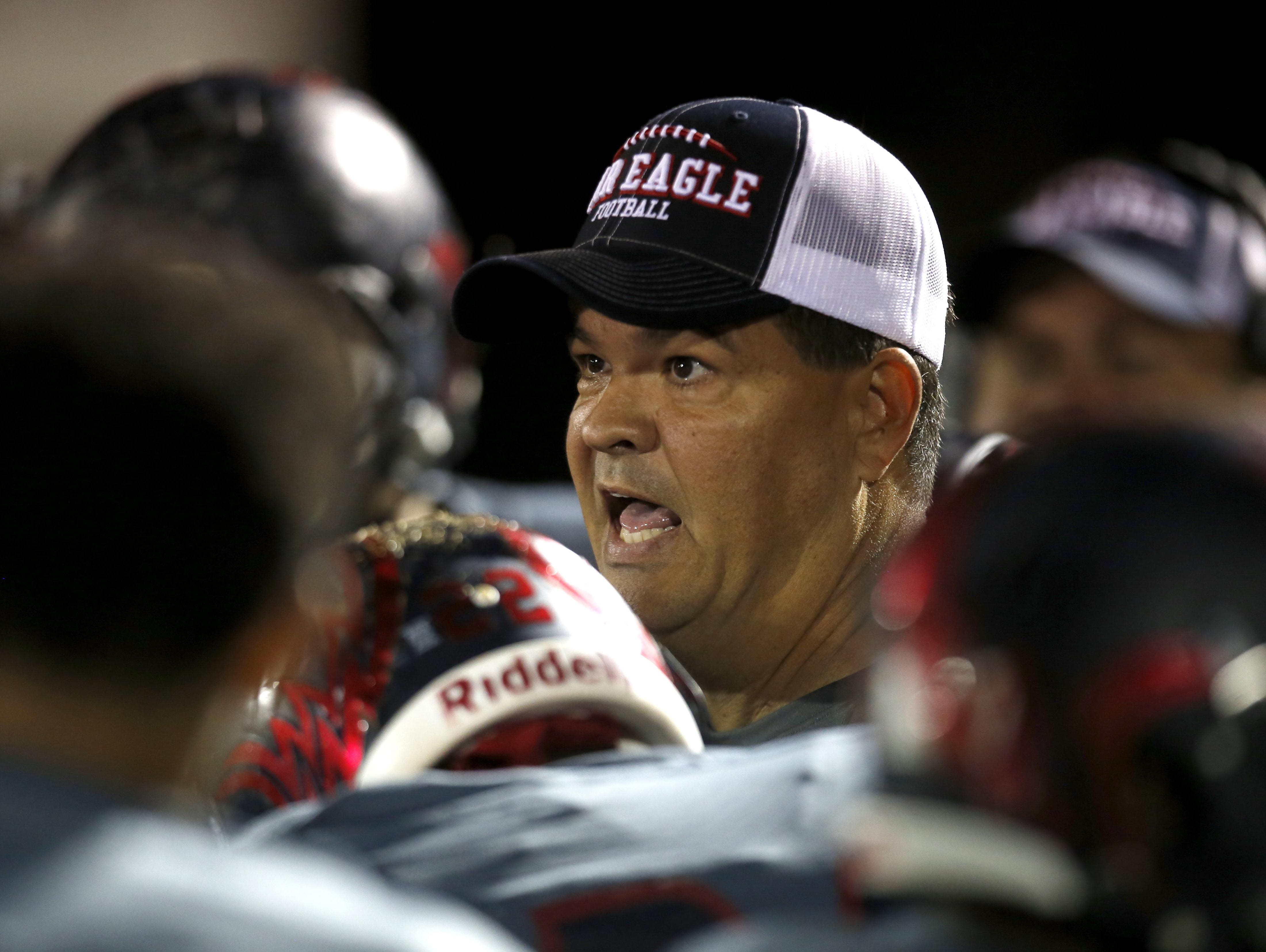 Wakulla head coach Scott Klees talks to his team during a timeout in their playoff game against Rickards two weeks ago. The War Eagles host a 5A state semifinal game against Clay.