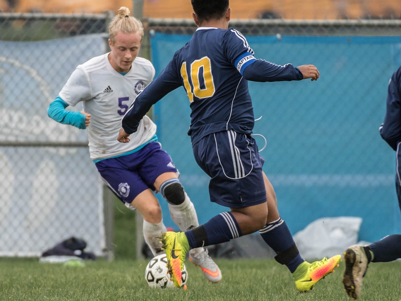 Lakeview's Theodor Pfeiff (5) and Battle Creek Central's Jesus Bautista (10) and Allen Duran (8) go for the ball during the All-City Soccer Championship on Saturday.