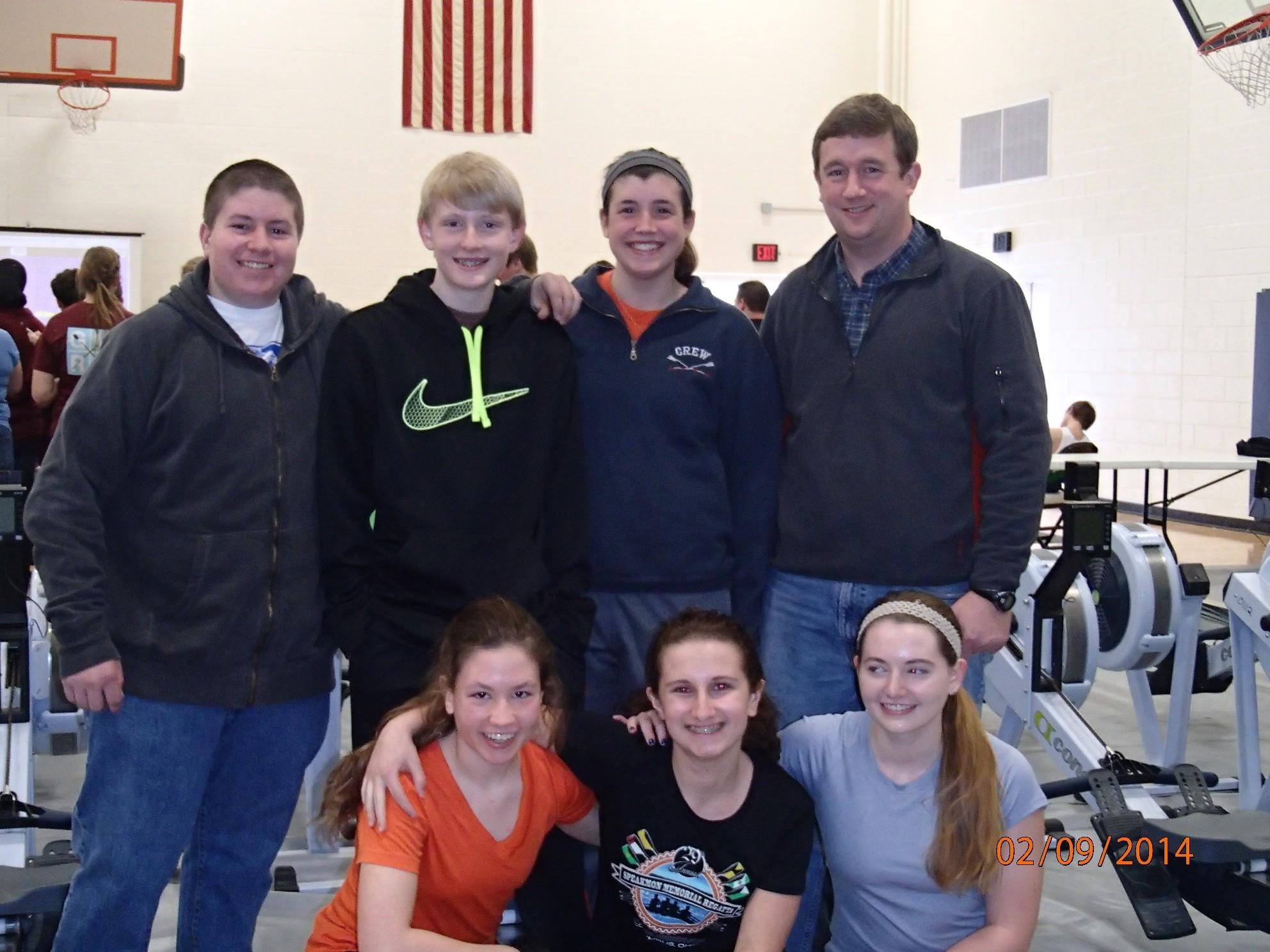 The Clermont Crew rowing team celebrates after competing in the World Indoor Rowing Championship in 2014. In back, from left, are Ben Marquez of Batavia, Ian Moorhead of Bethel, Ashley Collins of Glen Este and coach Paul Schmid. In front are Lindsey Marquez of Amelia, Ana Absalon of Anderson and Camile Gilbert of Walnut Hills.