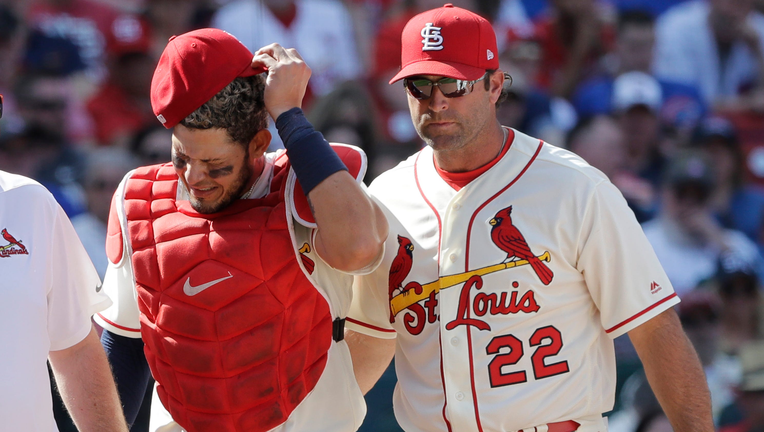 Cardinals' Yadier Molina, injured on foul tip to groin, returns home after surgery