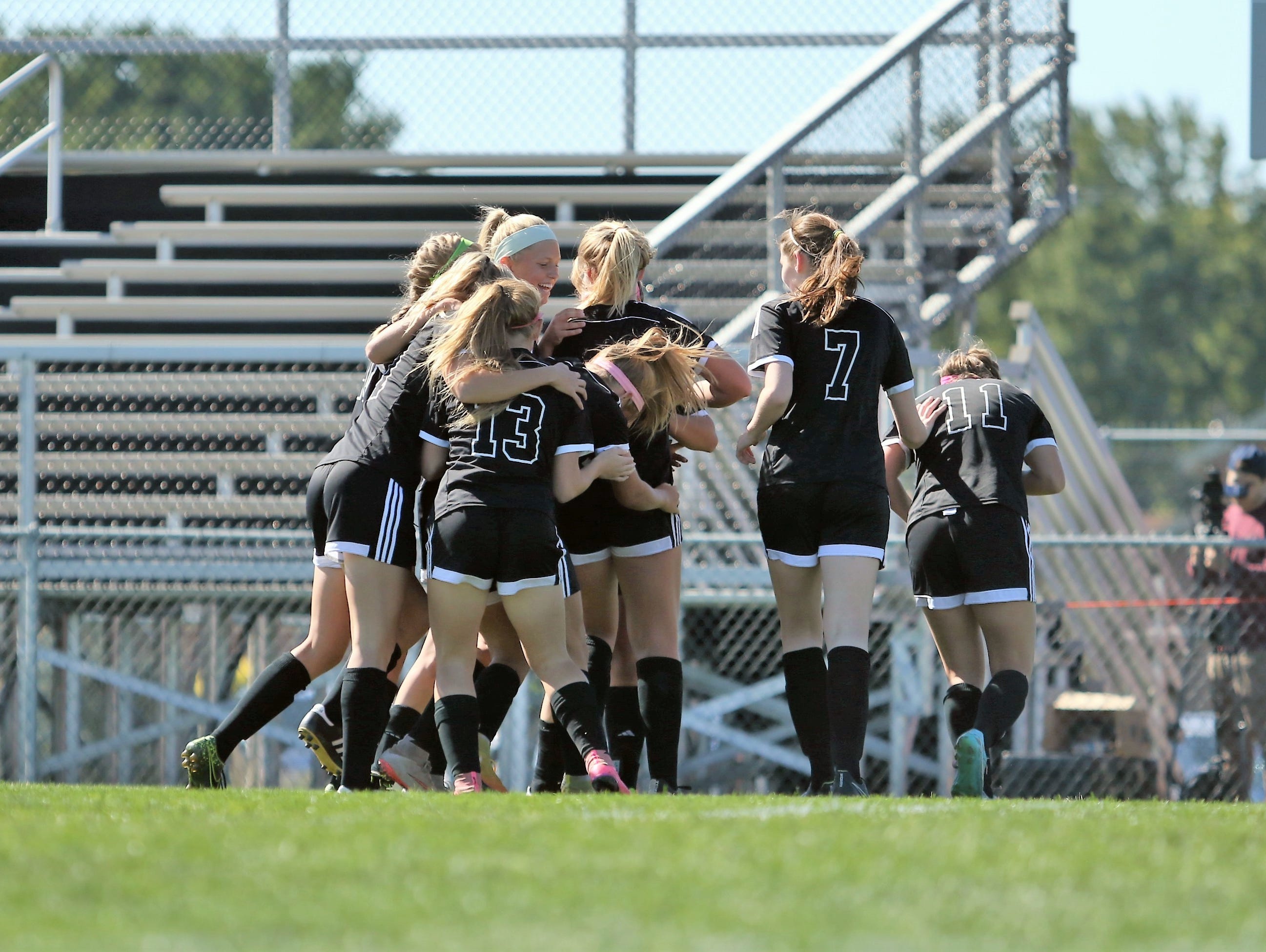 Noblesville players celebrate after a goal in their win over Hamilton Southeastern Saturday.