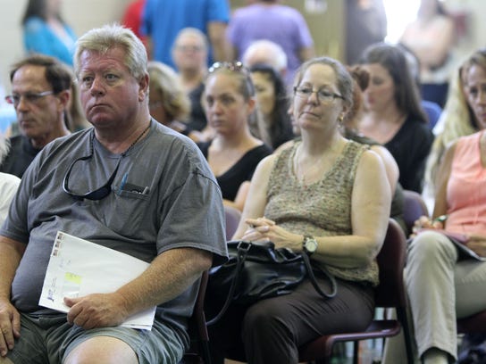 Tom Porter, a Sandy victim of Toms River, attends a