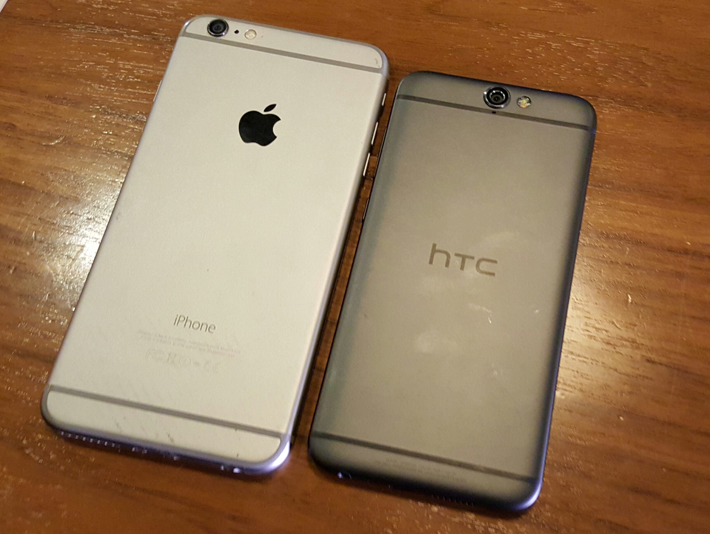 HTC's new One A9 smartphone (right) shares a design similar to Apple's iPhone 6 and 6 Plus line (left)