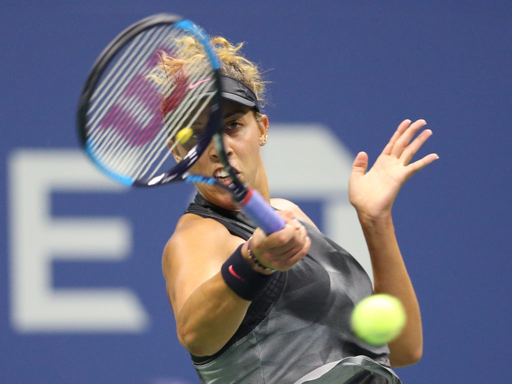 Madison Keys, of the U.S., returns a shot to Elina Svitolina, of the Ukraine, on day eight of the U.S. Open tennis tournament at USTA Billie Jean King National Tennis Center in New York.