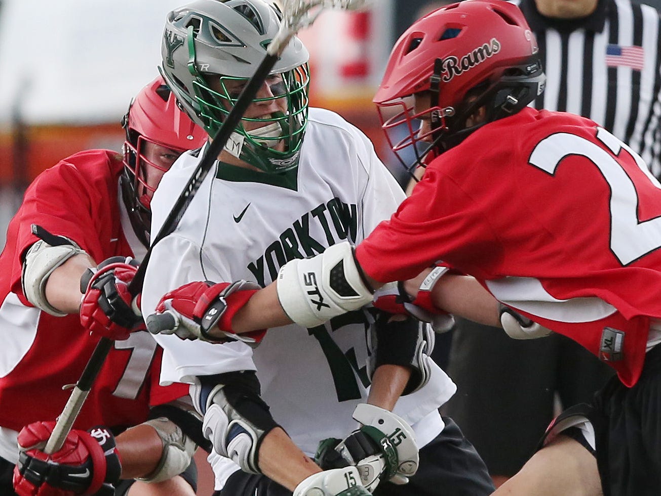 Yorktown's Kyle Casey (15) tries to get off a shot in front of Jamesville-Dewitt's Casey Platonic (21) during the NYSPHSAA Class B championship lacrosse game at Middletown High School June 11, 2016. Jamesville-Dewitt won the game 9-6.