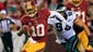 Washington Redskins quarterback Robert Griffin III (10) runs with the ball as Philadelphia Eagles outside linebacker Connor Barwin (98) chases in the second quarter at FedEx Field.
