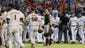 The benches clear s the San Francisco Giants and Texas
