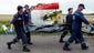 Rescue forces carry bodies of passengers at the crash site of Malaysia Airlines Flight 17 near Donetsk, Ukraine.