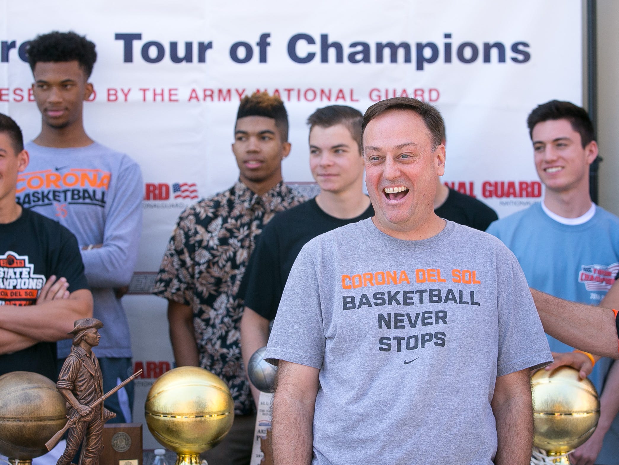 Tempe Corona del Sol head coach Sam Duane Jr. after accepting the Army National Guard National Rankings Trophy at their school in Tempe on Wednesday, April 8, 2015.