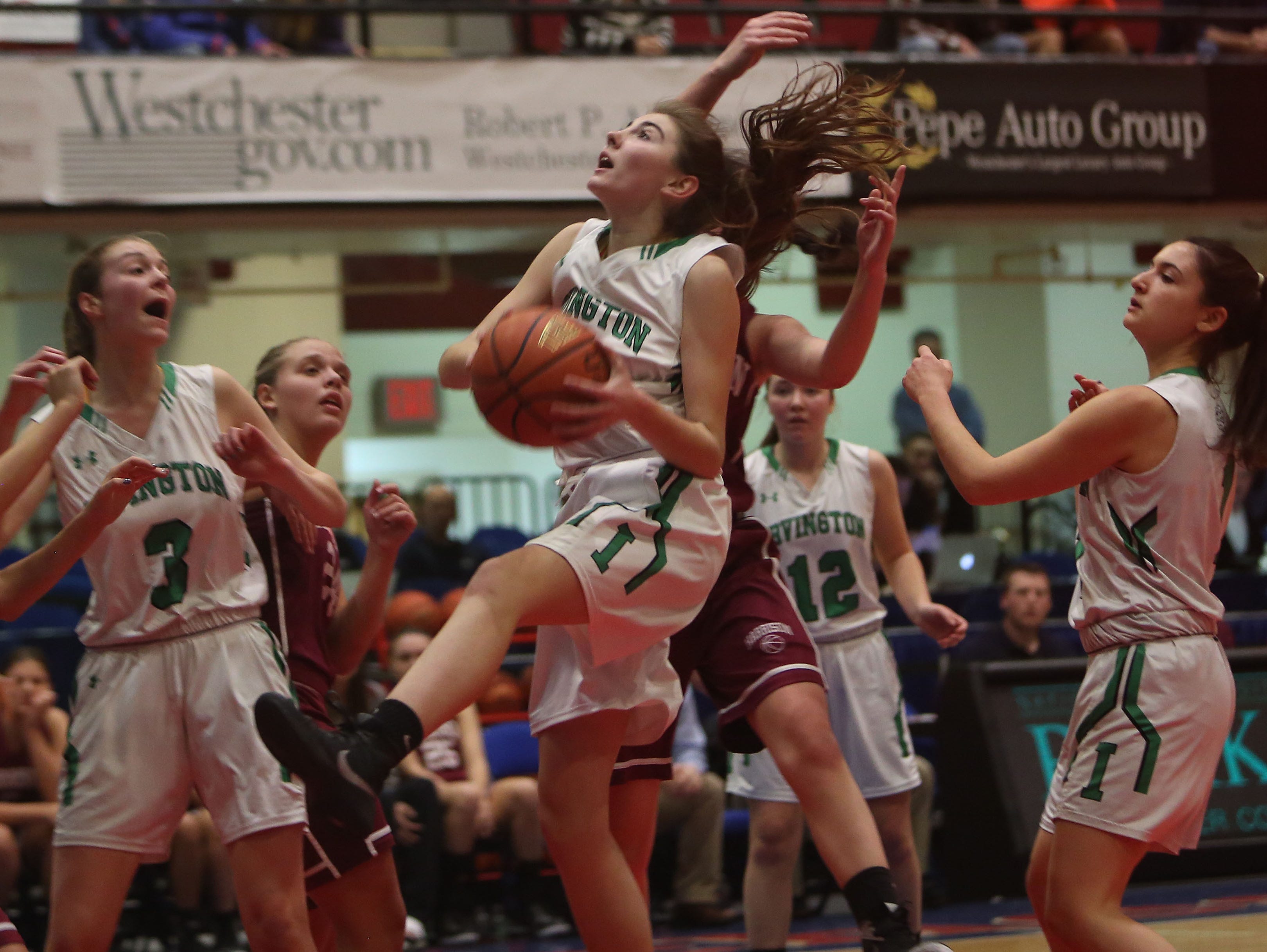 Irvington defeated Harrison 57-55 in the challenge game of the Slam Dunk Tournament at the Westchester County Center in White Plains Dec. 26, 2015.