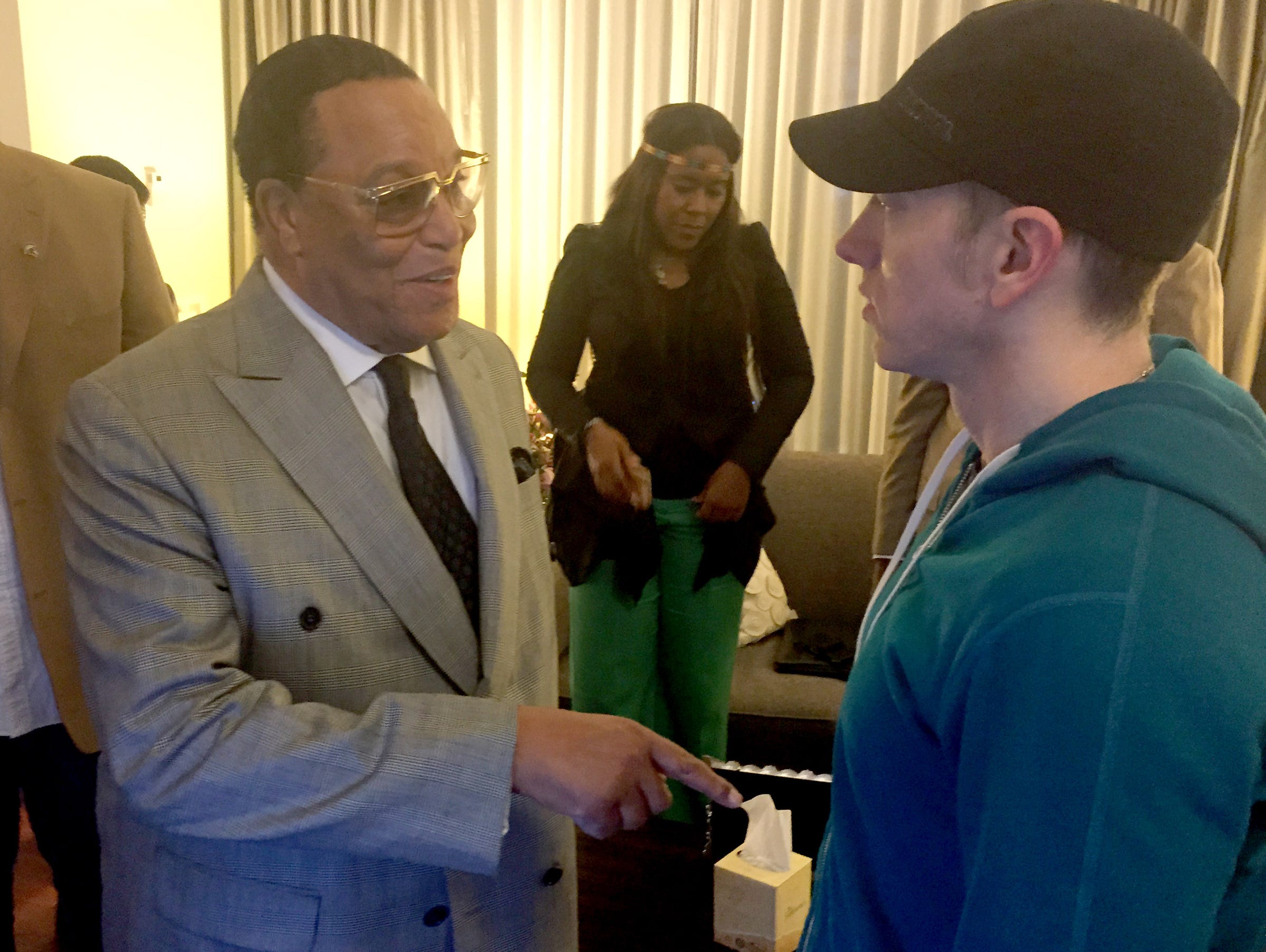 Minister Louis Farrakhan of the Nation of Islam meets in Detroit with rapper Eminem on Aug. 25, 2015.