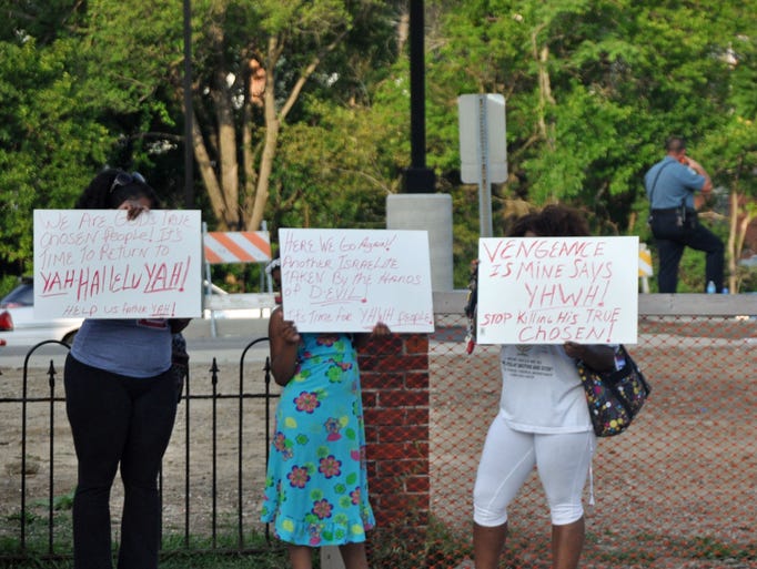 A peaceful protest took place at the Ferguson Police Department Sunday afternoon. The protest was hours before the looting and violence occurred in Ferguson Sunday evening and into Monday morning.