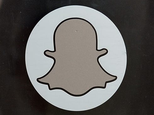 The Snapchat logo is seen at the front entrance new headquarters of Snapchat in Venice Beach, CLif.