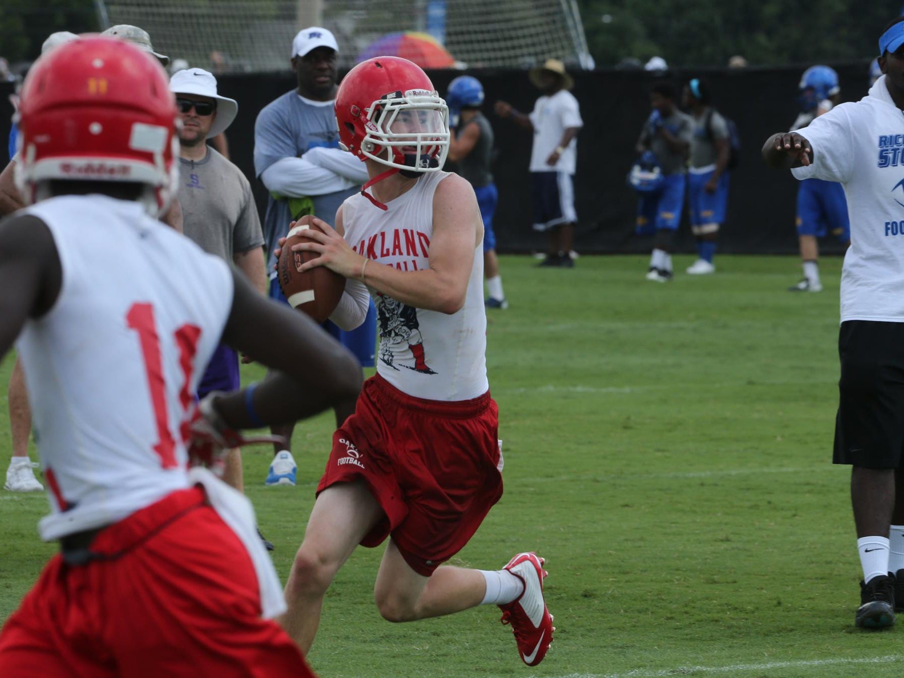 Oakland quarterback Cody Miller looks downfield during Saturday's 7-on-7 tournament at MTSU. Oakland finished runner-up to Marshall County.