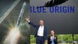 Amazon CEO Jeff Bezos, left, unveils the new Blue Origin