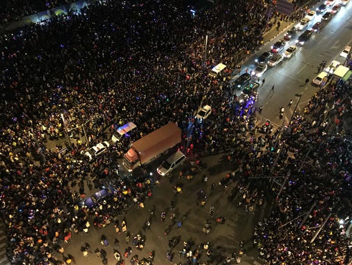 This overhead view shows emergency vehicles in the